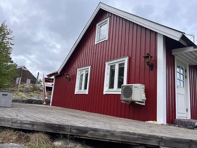 Rött hus med veranda